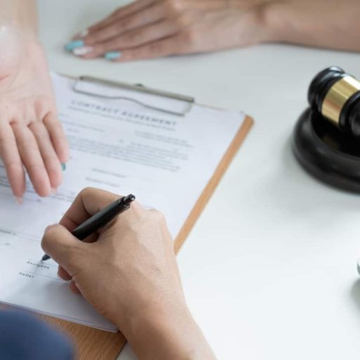 judge-gavel-with-justice-lawyers-having-team-meeti-2022-10-04-00-16-38-utc (1)